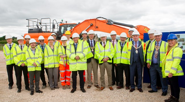 Partners mark progress on vital infrastructure to support economic growth on the outskirts of Newton Abbot. Partners mark progress on infrastructure development